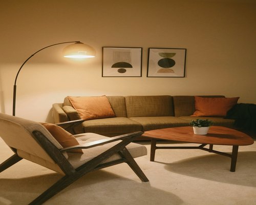 Quiet home atmosphere after work with soft warm lamp lighting